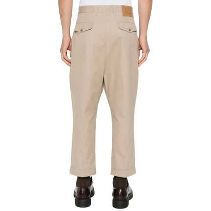 Model Back View of Ami Paris Carrot Oversized Trousers Beige