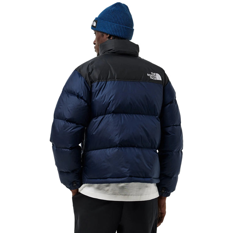 Model Back View of The North Face 1996 Retro TNF Navy Jacket
